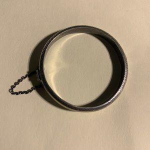 Vintage sterling silver babies bracelet with a security chain.